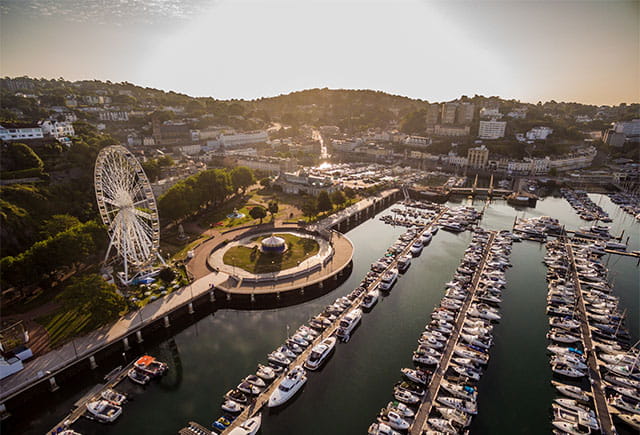 A view over Torquay harbour at sunrise