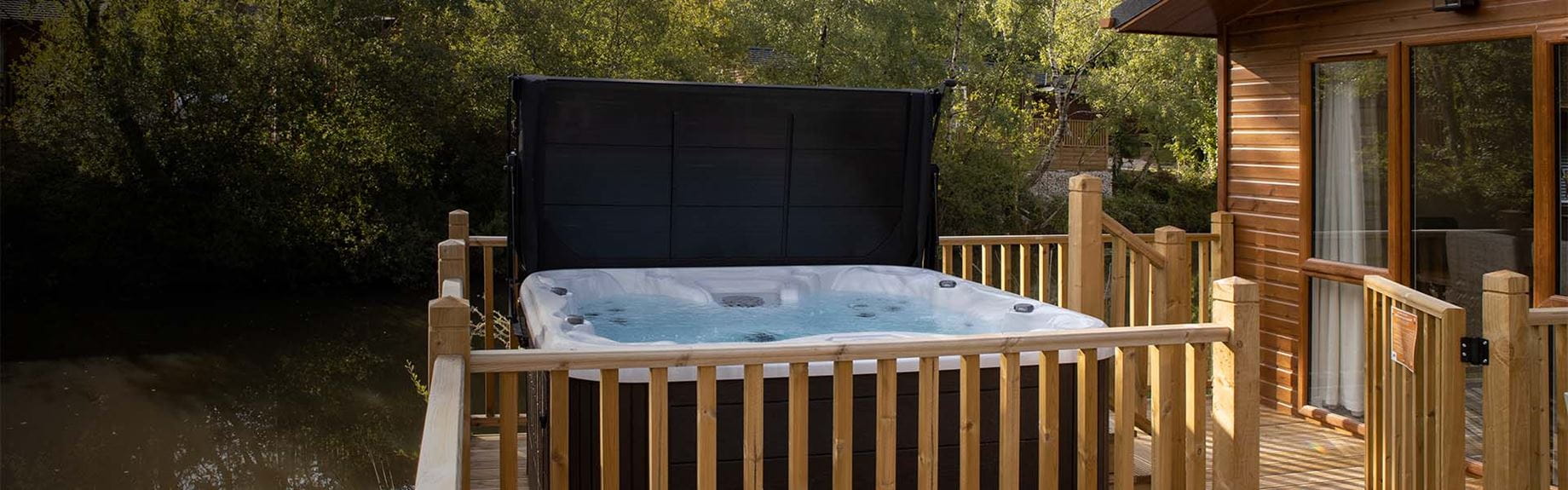 A luxury lodge veranda with a hot tub