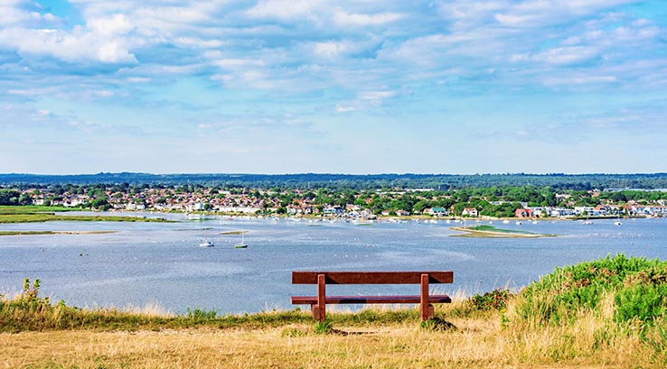 a clifftop bench looking out over Christchurch