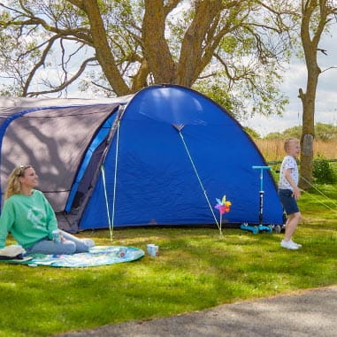 Blue tent on grass