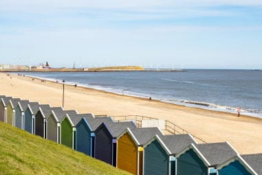 Colourful beach huts on the beach