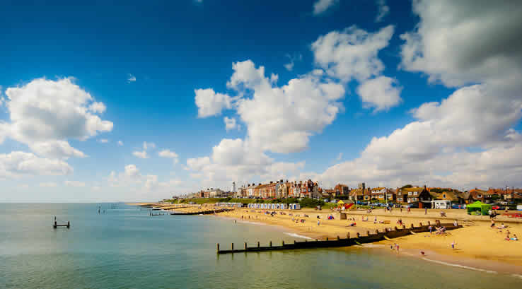 scenic view of a beach with holiday attractions