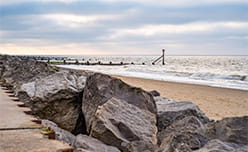 Rocks and sea defences along Cart Gap in Norfolk