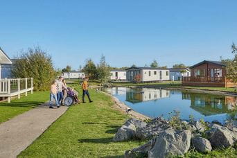 A family exploring Southview Holiday Park's lodges in Skegness