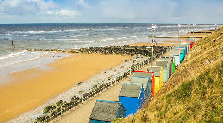 elevated view of Sheringham beach and beach huts