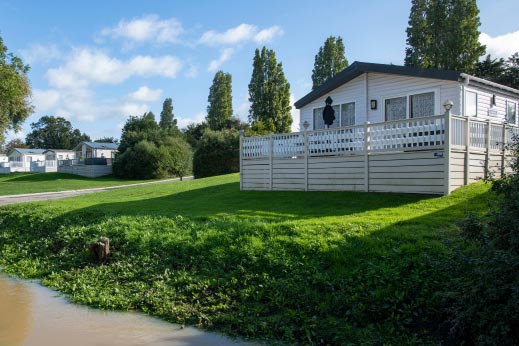 Caravan with veranda at Parkdean Resorts