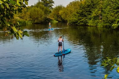 Man paddle boarding