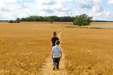 Kids walking through a maze field