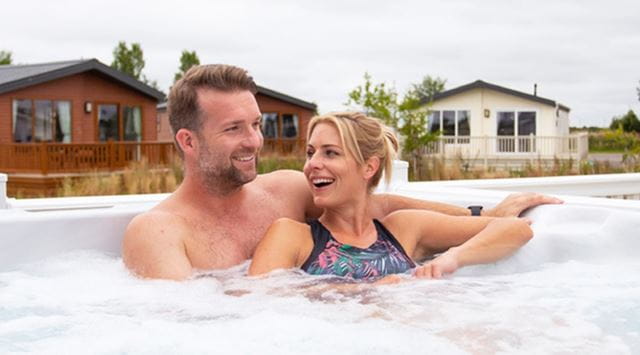 a couple in a hot tub