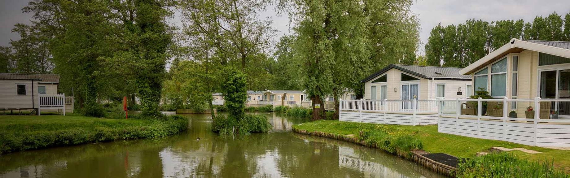 Luxury lodges overlooking at lake in Essex