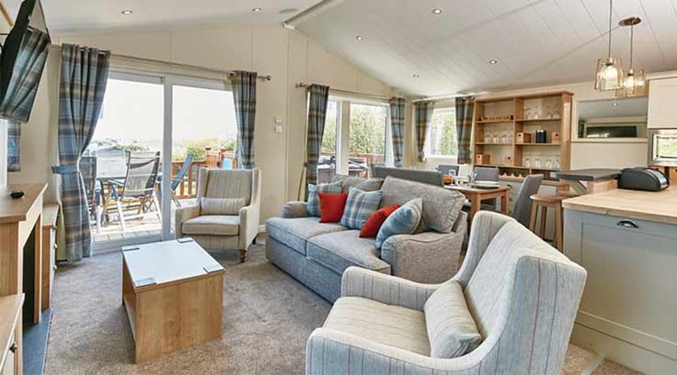 A bright, open plan lodge living room