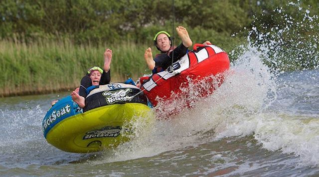 Ringos splashing in the wake of a speedboat at Action Watersports in Kent