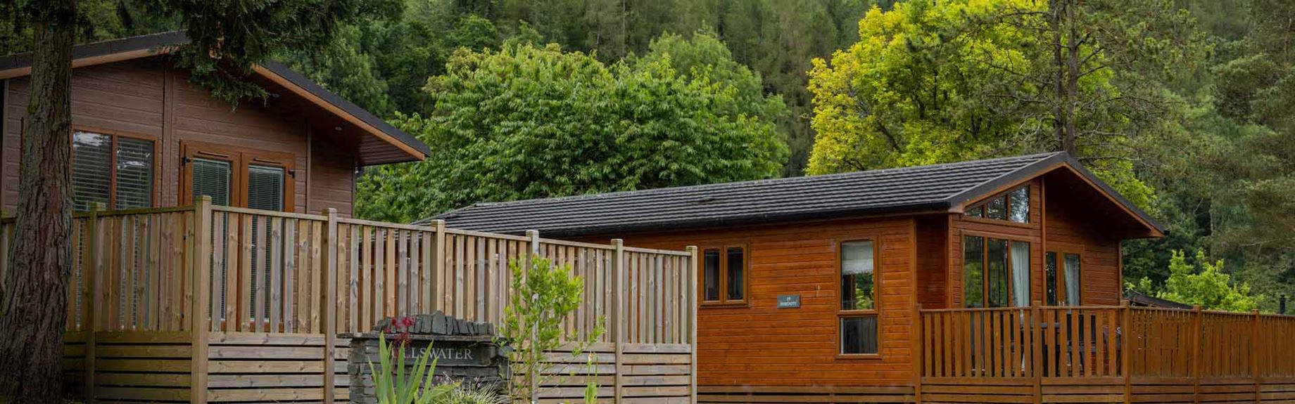 A row of holiday lodges in the Lake District