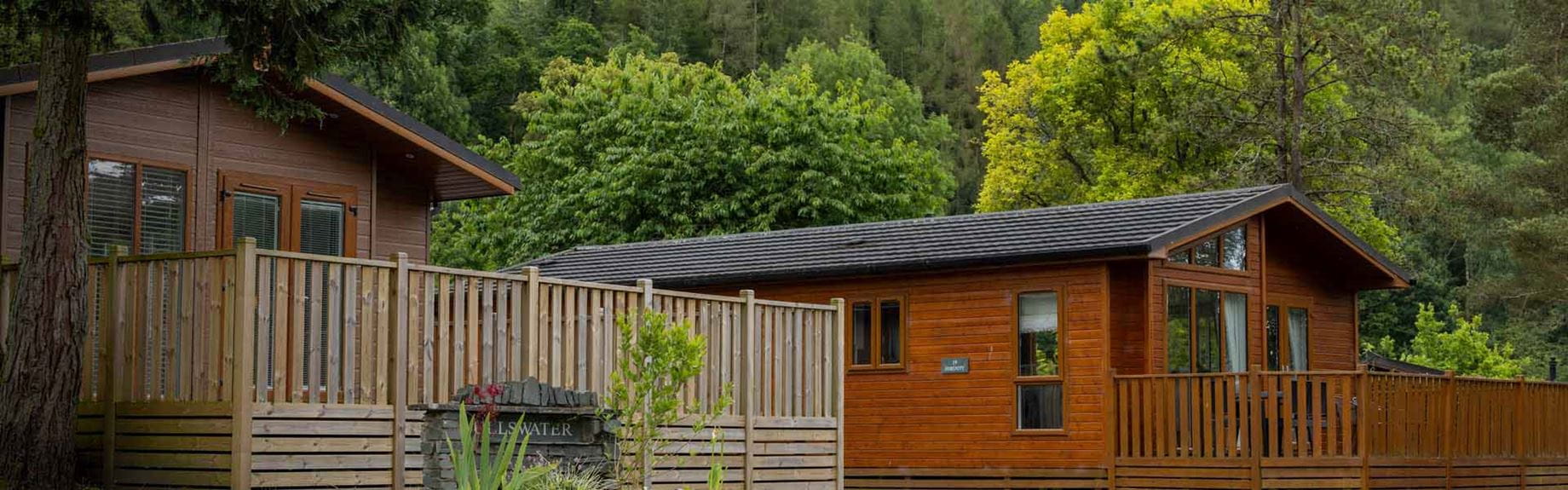 A row of holiday lodges in the Lake District