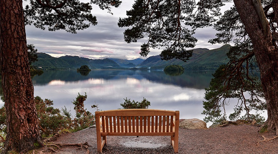 Keswick - view of Derwentwater shaded by trees