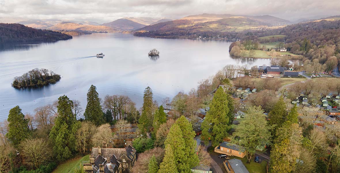 An aerial view of a holiday park on Lake Windermere on a crisp spring day
