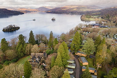 An aerial view of a holiday park on Lake Windermere on a crisp spring day