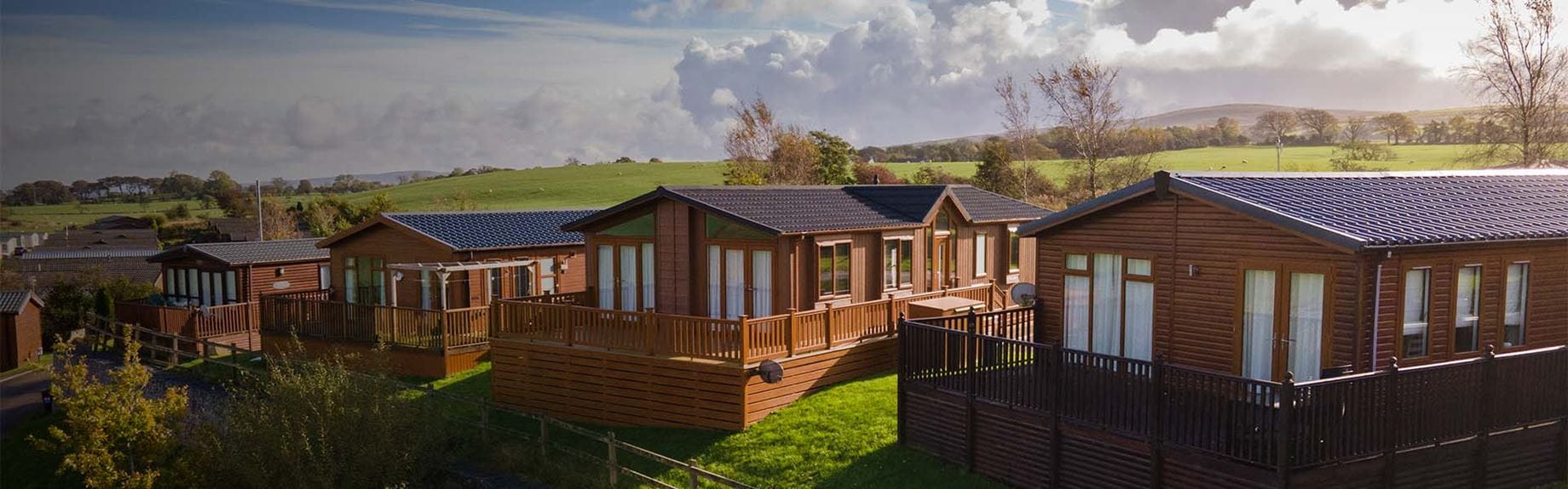 A view of luxury lodges overlooking the Lancashire countryside