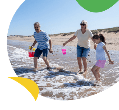A family enjoying the sea at Crimdon Dene beach