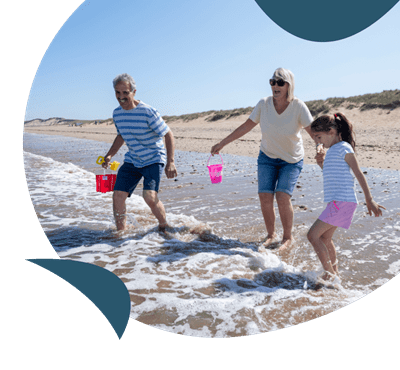 A family enjoying the sea at Crimdon Dene beach
