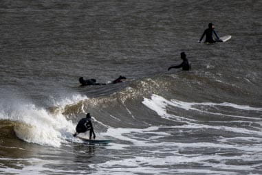 Surfing at Tynemouth beach
