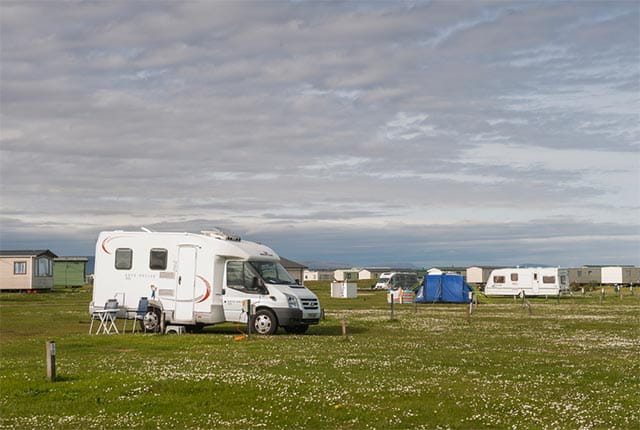 Motorhomes and tents pitched on Grannies Heilan' Hame Campsite