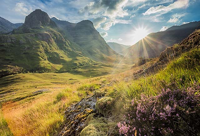 Glencoe mountain pass in Scotland on a sunny summer day