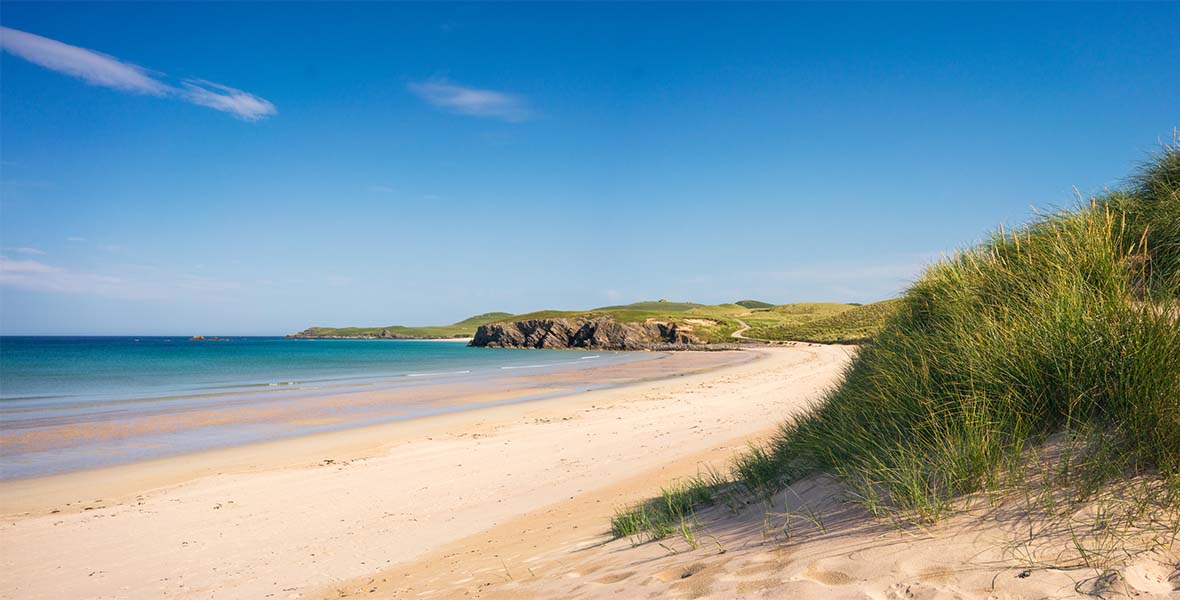A sunny day at the beach on the north coast of Scotland