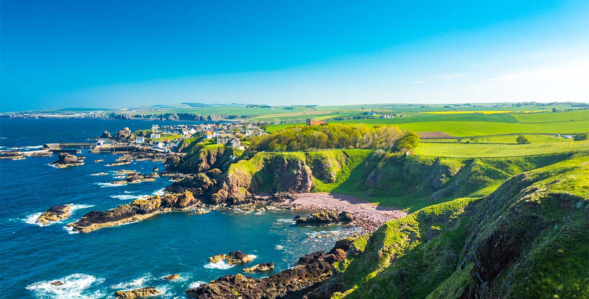 An aerial view of St Abbs on Scotland's coast in the summer