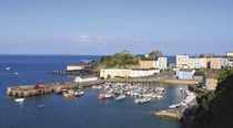 A view of boats docked at Tenby Harbour in Pembrokeshire