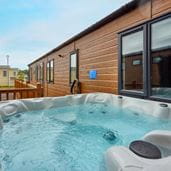 Hot tub on the veranda of a lodge