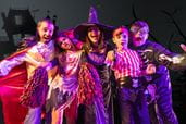 Kids dressed up in Halloween costumes