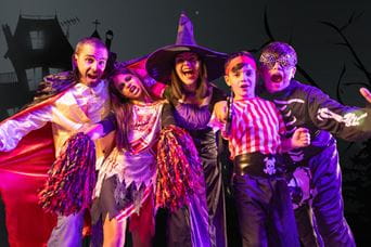 Kids dressed up in Halloween costumes