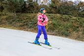 a child on ski's skiing