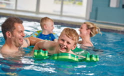 Dad and son in the swimming pool