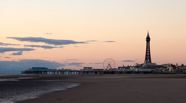 Sunset over Blackpool South Beach with the Tower and pier in the background