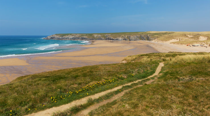 A view over the dunes of Crantock Beach in Cornwall