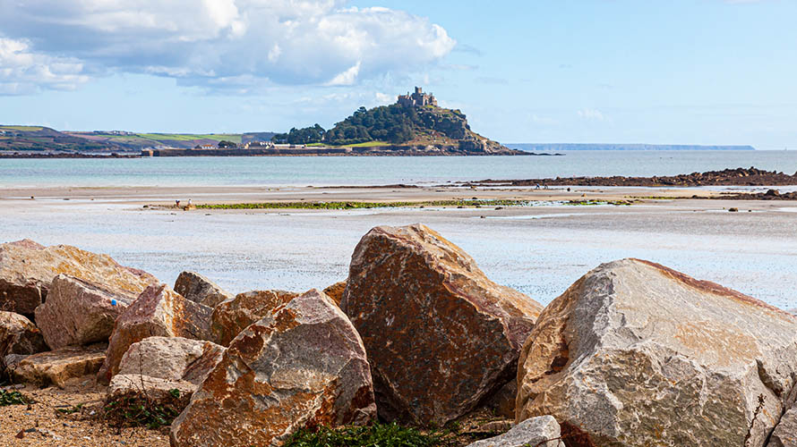 Dog friendly Longrock Beach near Penzance with St Michaels Mount visible in the distance