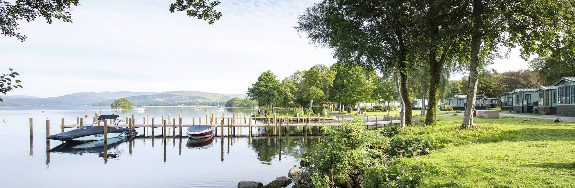 A view of Lake Windermere and the jetty at Fallbarrow Holiday Park