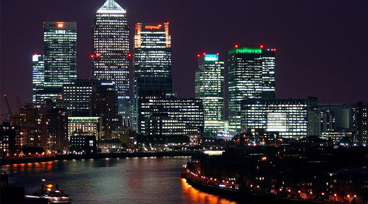 Canary Wharf in London, lit up at night