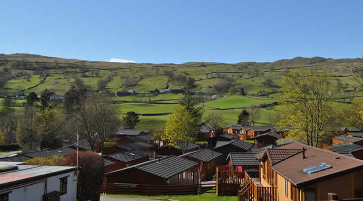 View of lodge rooftops with countryside in background