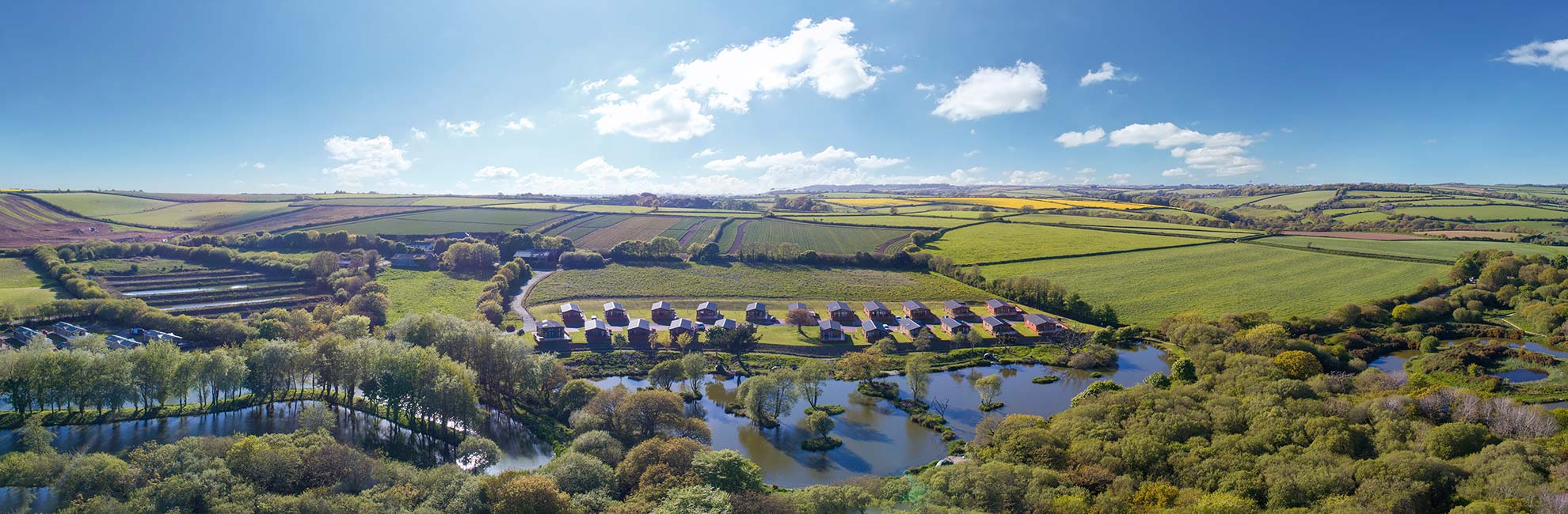 An aerial view of White Acres Holiday Park and surrounding countryside