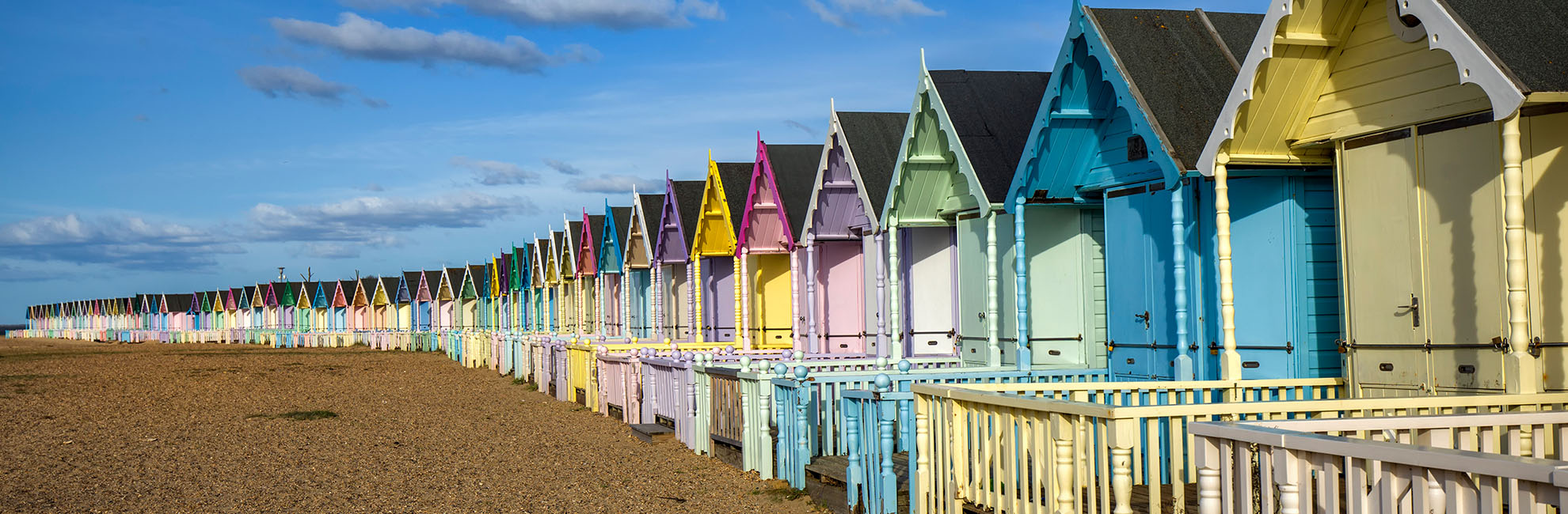 Colourful beach huts on Mersea Island in Essex