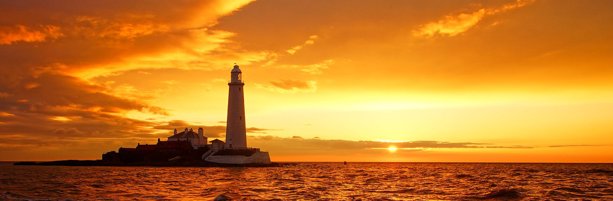 Sunset over St. Mary's Lighthouse in Whitley Bay