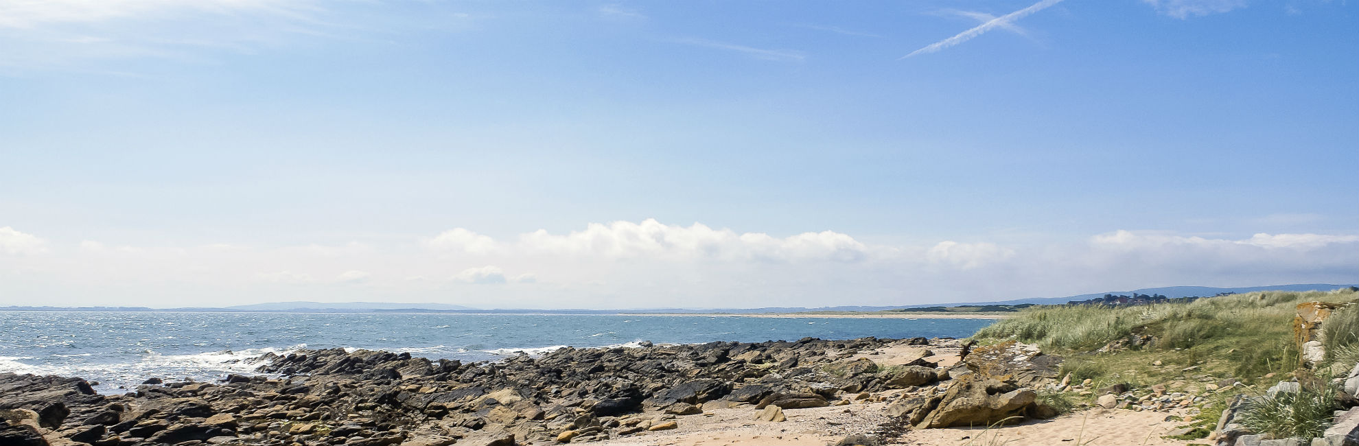 Looking out to sea from the rocky coastline of Dornoch in Scotland