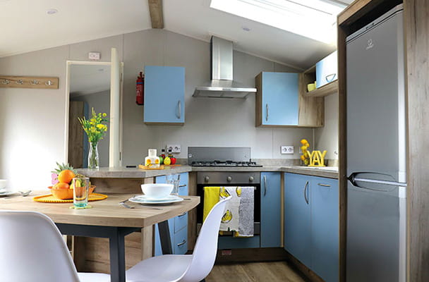 The kitchen dining area of a central lounge caravan