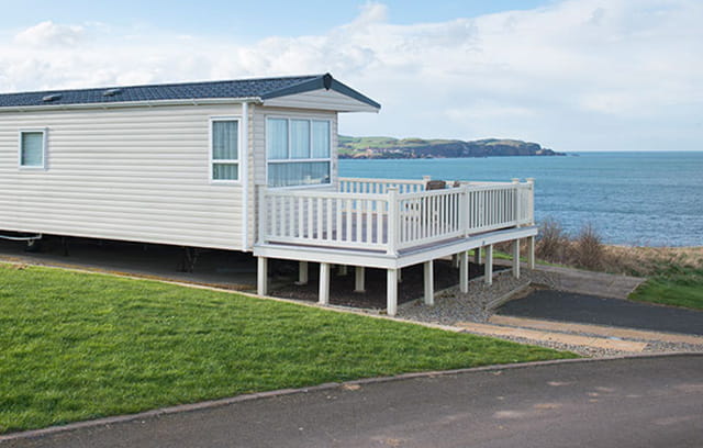 A static caravan with a sea view