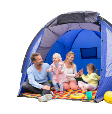 Family of four with two young children sat on a colourful blanket inside a blue tent