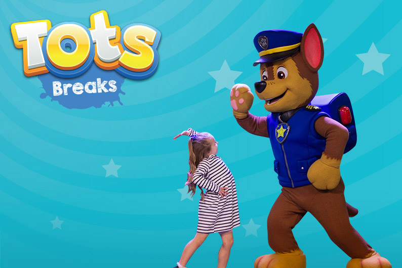 PAW Patrol character giving a high five to a little girl