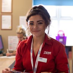 a Parkdean Resorts employee smiling 